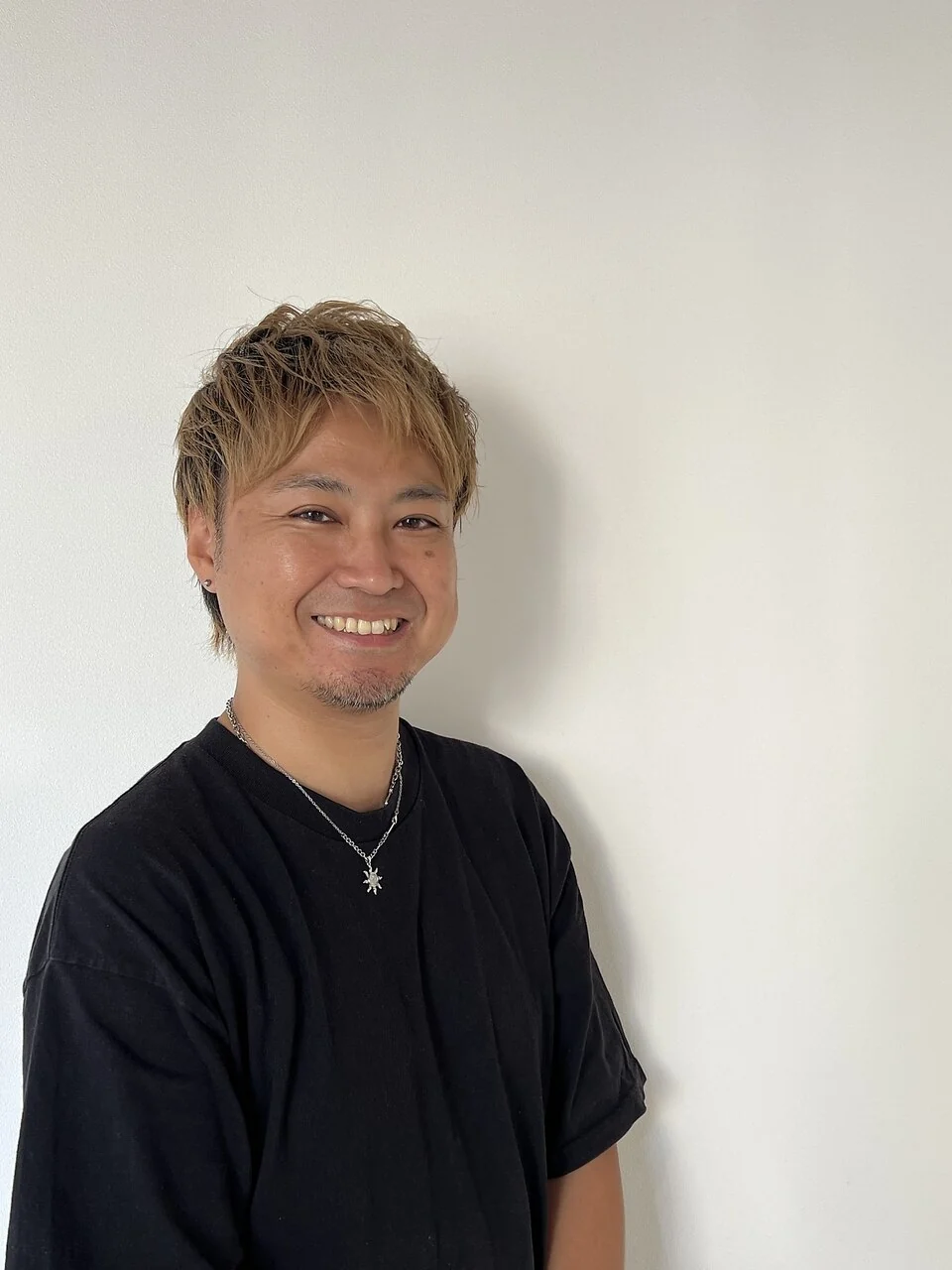 店長 長井秀明